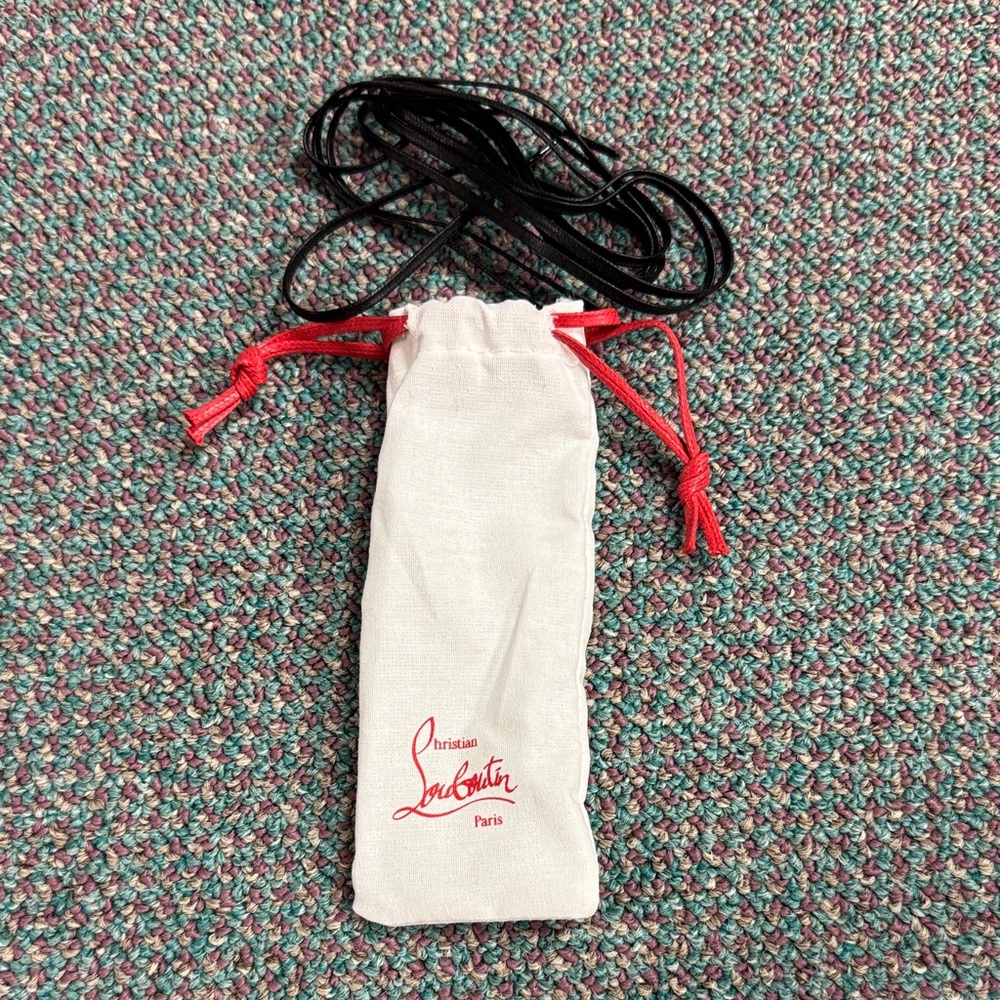 Christian Louboutin White Pouch with Red Accents and black waxed laces